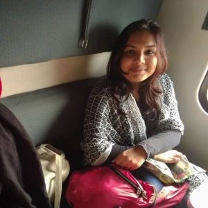 Female traveler in a train in Pakistan