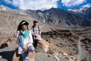 Female tour guide with foreign tourist in Hunza Gilgit Baltistan