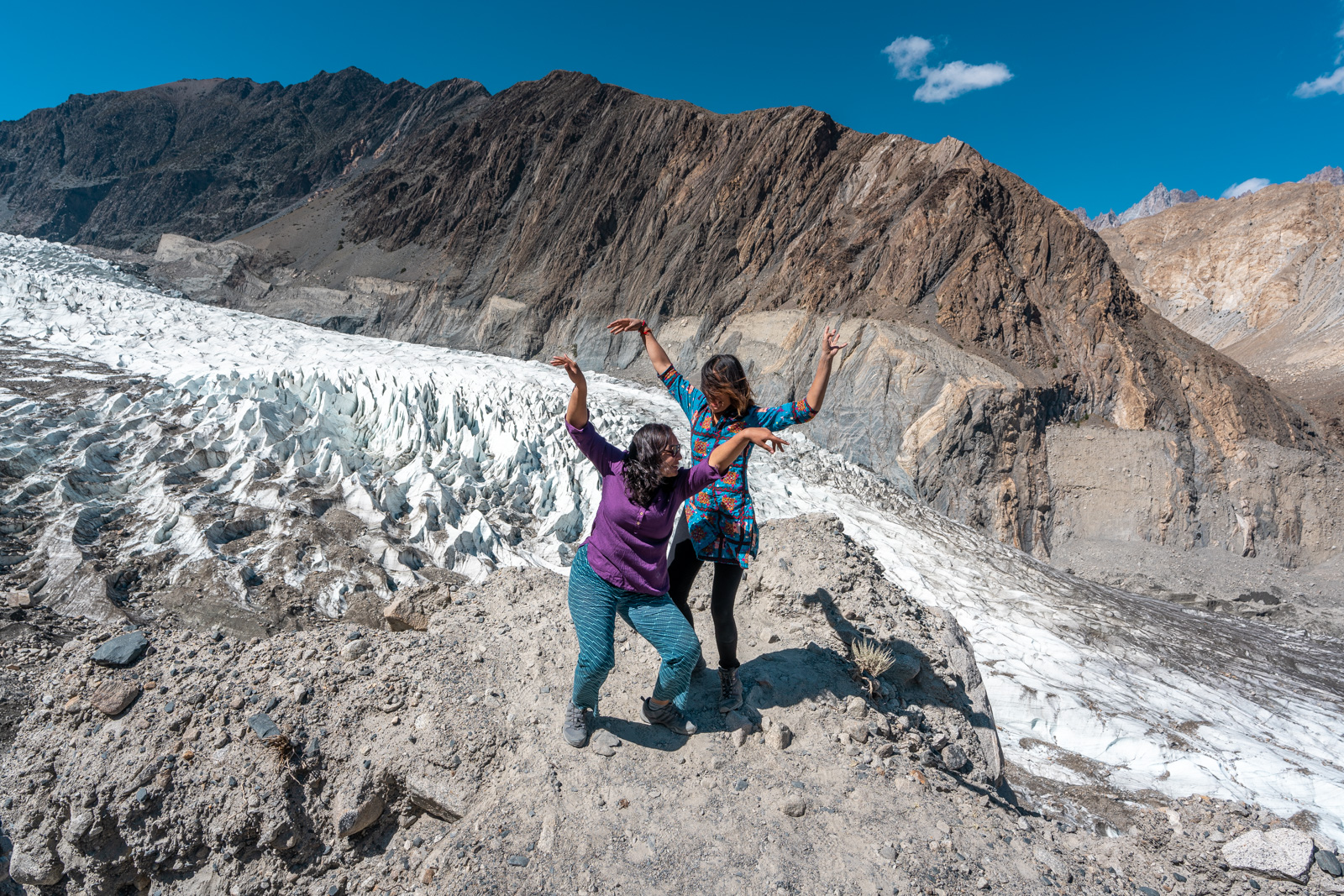 Female tourists at white glacier in Hunza Gilgit Baltistan