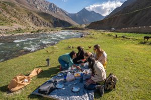 Female tourists having picnic near Naran