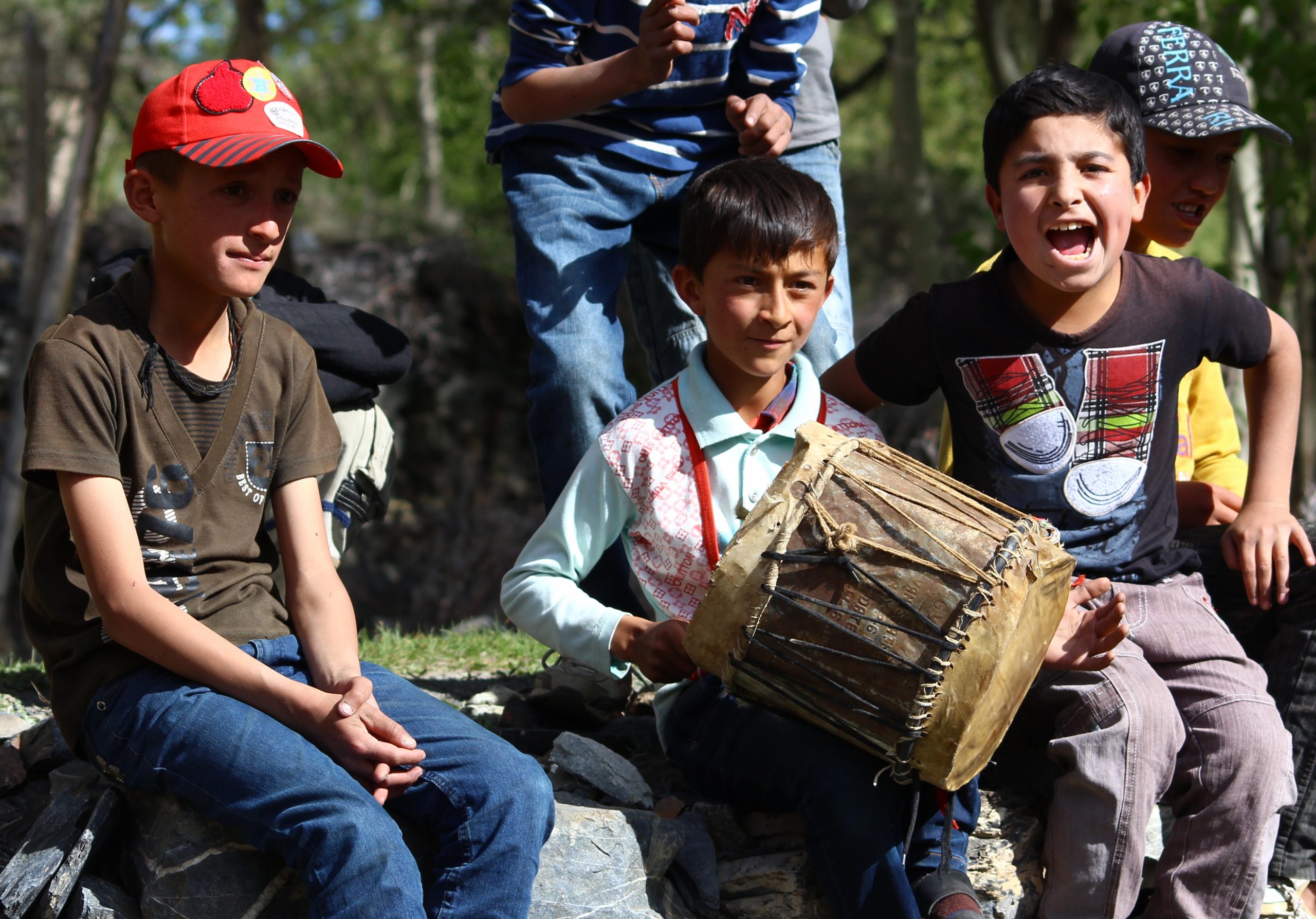 local kids playing music in Hunza